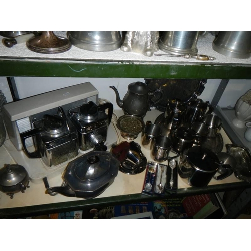 15 - Three shelves of assorted metal ware including tea sets, trays etc., COLLECT ONLY.