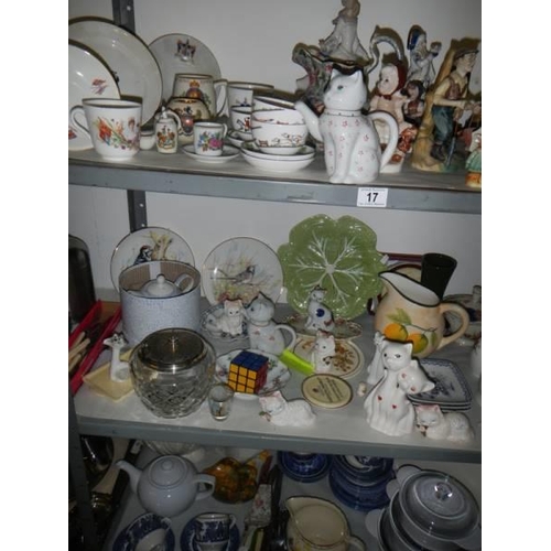 17 - Three shelves of assorted ceramics, tea ware, figures etc., COLLECT ONLY.