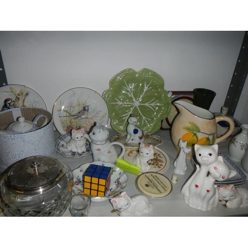 17 - Three shelves of assorted ceramics, tea ware, figures etc., COLLECT ONLY.