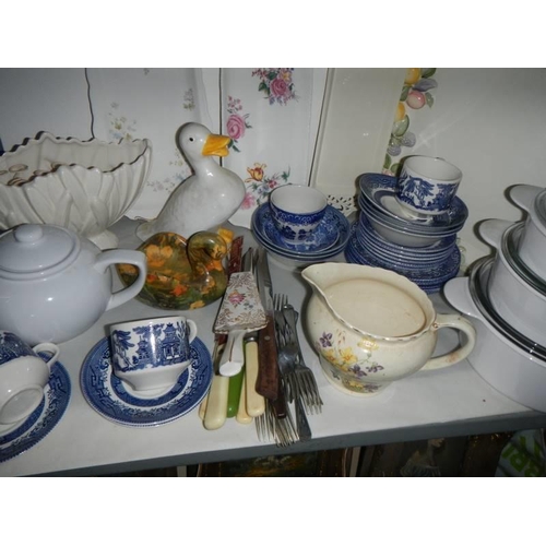 17 - Three shelves of assorted ceramics, tea ware, figures etc., COLLECT ONLY.