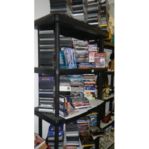 24 - Five shelves of CD's and DVD's, COLLECT ONLY.