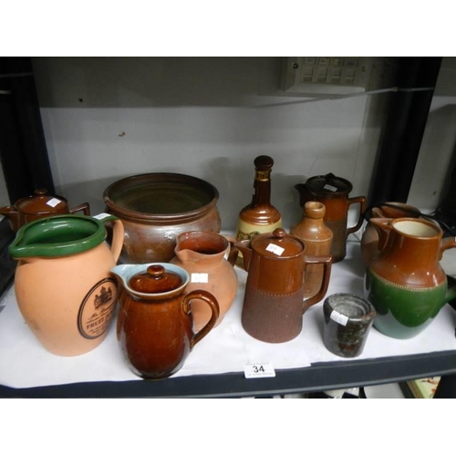 34 - A mixed lot of stoneware jugs etc., COLLECT ONLY.