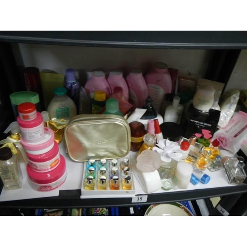 35 - A shelf of cosmetics, perfume etc.,