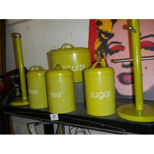 37 - A set of storage canister, mug tree etc.,