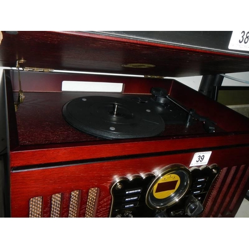 39 - A 20th century record player / radio. COLLECT ONLY.