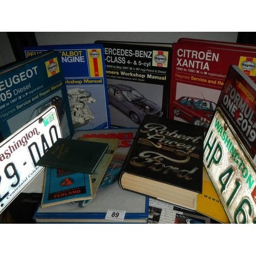 89 - A quantity of car manuals, Ordnance Survey maps etc.,