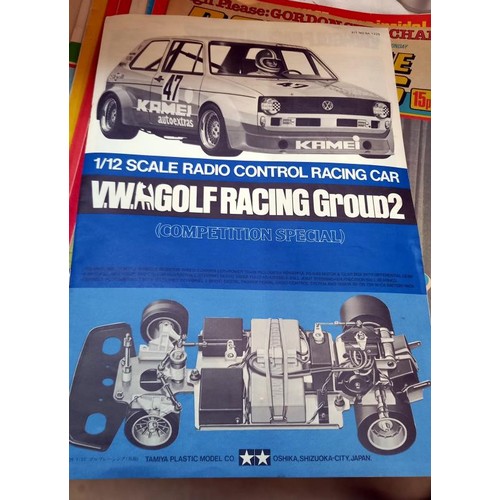 1147 - A boxed as new kit Tamiya 1/12 scale VW Golf racing group 2 r/c car and an as new boxed acoms ap-227... 