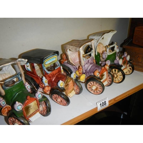 108 - Four ceramic vintage cars.