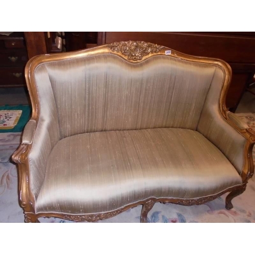 2859 - A gilt framed two seater sofa. COLLECT ONLY.