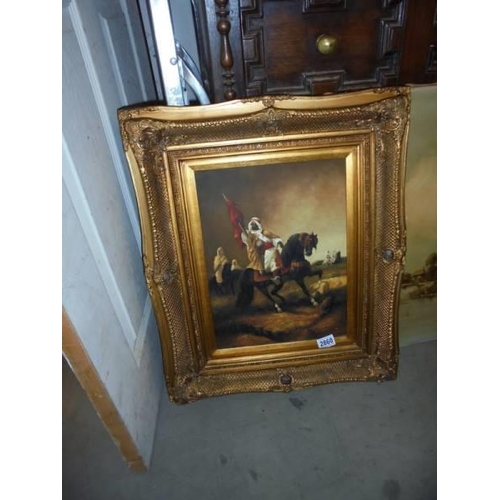 2860 - A gilt framed painting on board featuring a horse and rider, COLLECT ONLY.