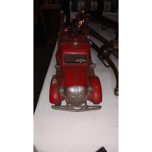 1367 - A large scale pressed steel fibre glass model of an American fire truck length 49cm