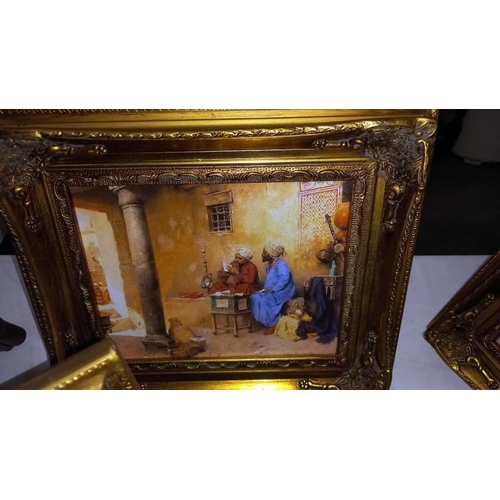 1373 - 4 gilt framed overpainted prints of Arabic/Indian scenes 31cm x 36cm