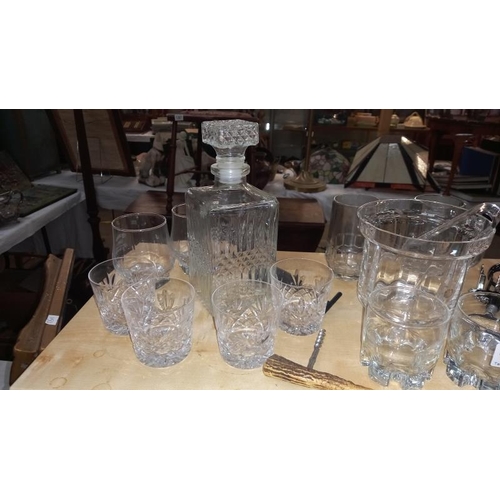 1375 - 2 decanters, glass ice bucket and quantity of glasses and bottle openers etc COLLECT ONLY