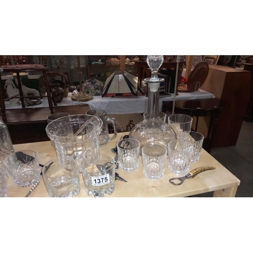 1375 - 2 decanters, glass ice bucket and quantity of glasses and bottle openers etc COLLECT ONLY