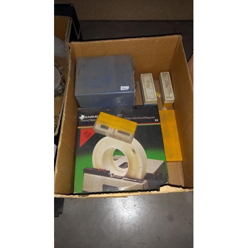 1380 - A boxed Paximat Triumph slide projector and various slides