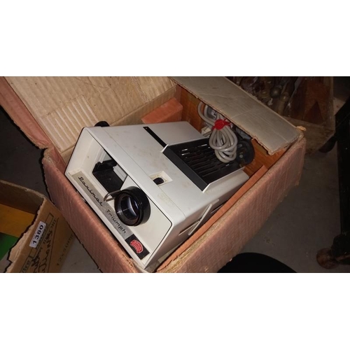 1380 - A boxed Paximat Triumph slide projector and various slides