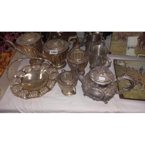 1384 - A quantity of silver plate including tea and coffee pots etc