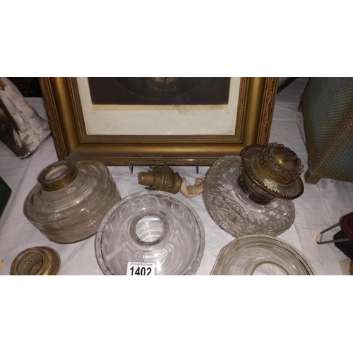 1402 - 4 glass oil lamp fonts and various burners a/f