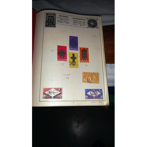 1420 - An album of mint Zimbabwe stamps and an album of Ethiopian stamps