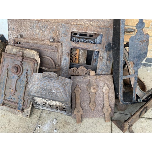 380 - A collection of heavy metal fireplace related items