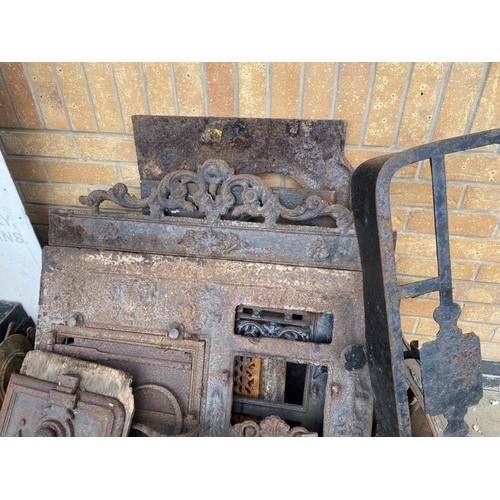 380 - A collection of heavy metal fireplace related items