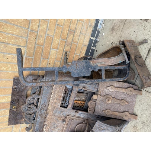 380 - A collection of heavy metal fireplace related items