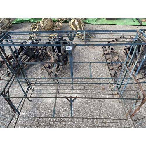 389 - A 3 part set of metal flower shelves