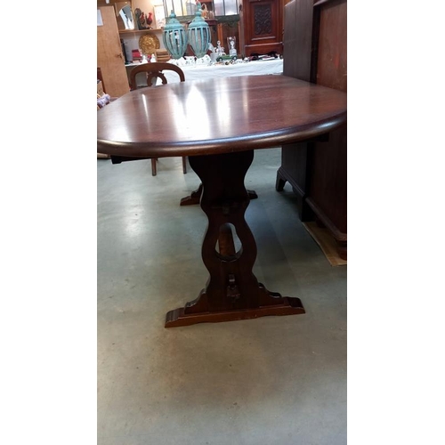 1508 - A dark oak oval extending pub style dining table, COLLECT ONLY.