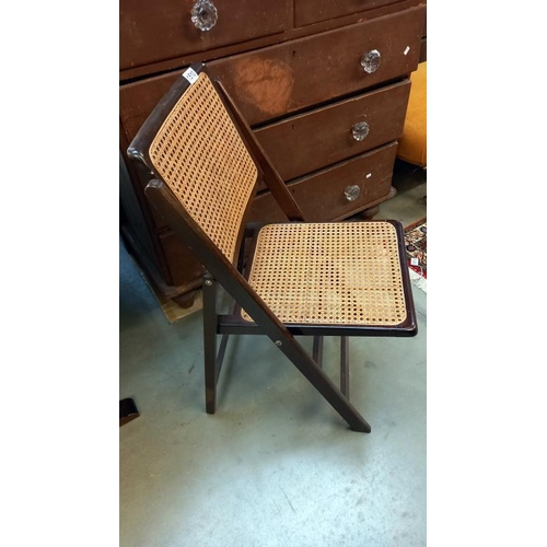 1510 - A wooden folding chair with bregere wicker panels, COLLECT ONLY