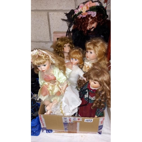 1572 - A box of 7 collectors Dolls including fairy etc. COLLECT ONLY