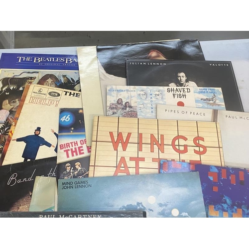 83 - A quantity of The Beatles Fab Four records in mostly good condition