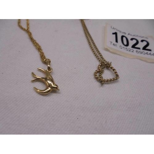 1022 - A 9ct gold swallow pendant on chain and a 9ct gold bracelet, 4.1 grams.