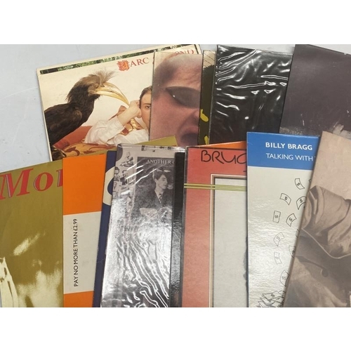 58 - A good lot of 20 LPs and 12 inch singles including Creatures, The Smiths, DEVO, New Order, Morrissey... 