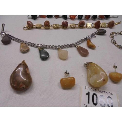 1060 - A mixed lot of natural stone bracelets, pendants and earrings etc.,