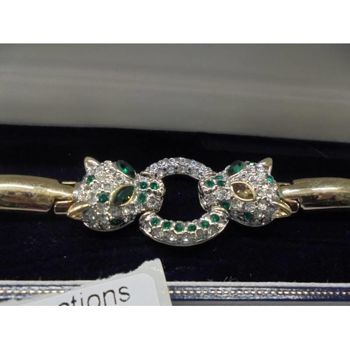 1061 - A Brooks & Bentley jewelled panther bracelet.