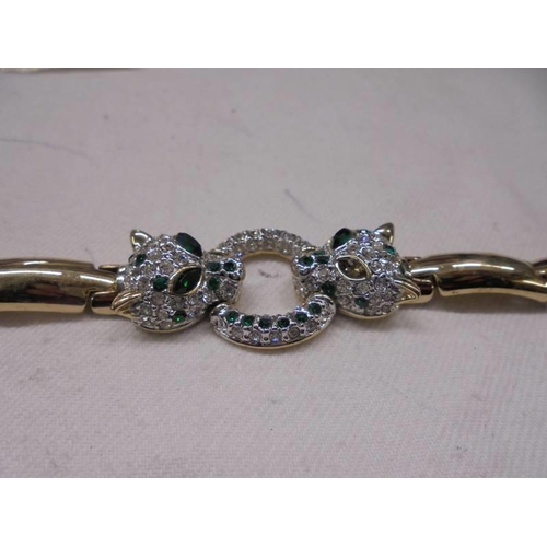 1061 - A Brooks & Bentley jewelled panther bracelet.