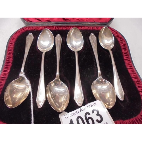 1063 - A cased set of six silver teaspoons, maker S Ltd., Birmingham 1924,