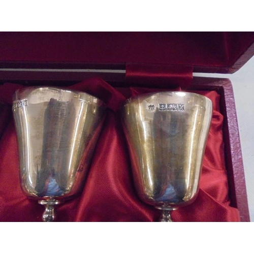 1065 - A cased set of six silver goblets, maker C S G & Co., Birmingham 1972.  With original purchase recei... 