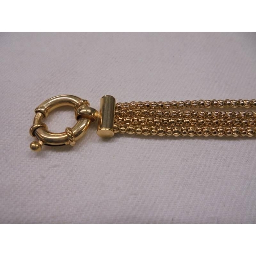 1076 - A 9ct gold ope twist bracelet, 12.5 grams.