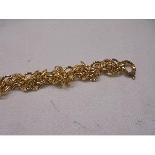 1078 - A 9ct gold bracelet, 12.8 grams.