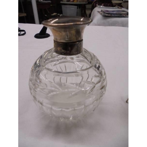 1114 - A silver topped scent bottle, silver pin tray, silver napkin ring, silver book mark and an a/f pill ... 