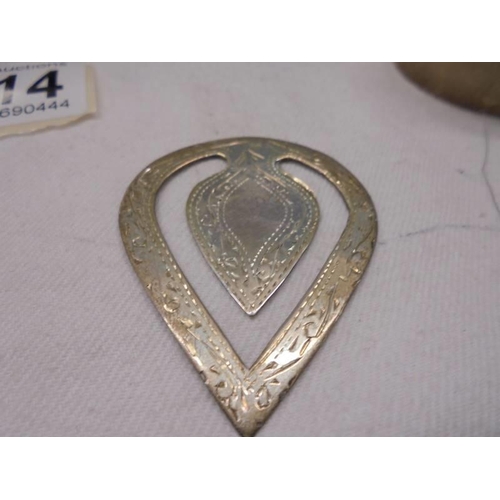 1114 - A silver topped scent bottle, silver pin tray, silver napkin ring, silver book mark and an a/f pill ... 