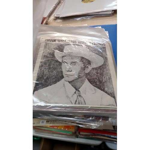 306 - Folder of Hank WIlliams 45's Thai