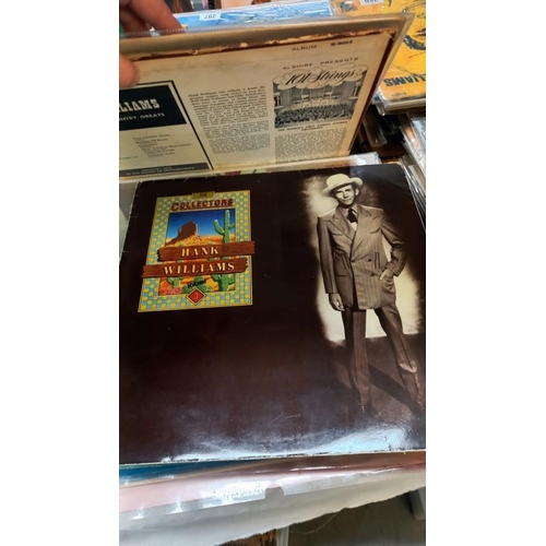 402 - A quantity of Hank Williams LP's 25+