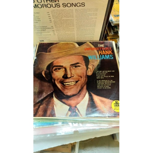 402 - A quantity of Hank Williams LP's 25+