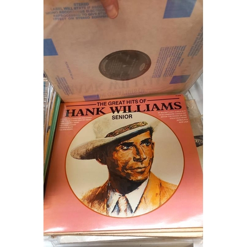 403 - A quantity of Hank Williams LP's 25+