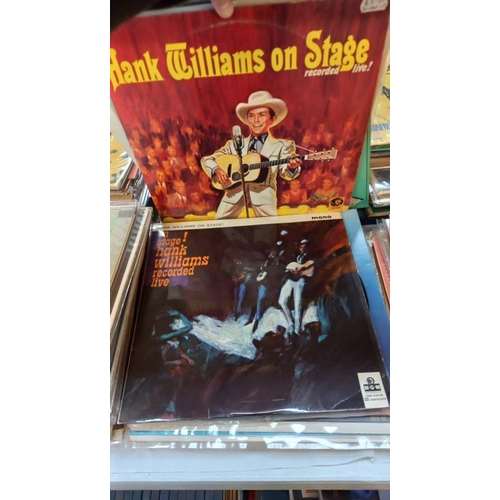 404 - A quantity of Hank Williams LP's 25+