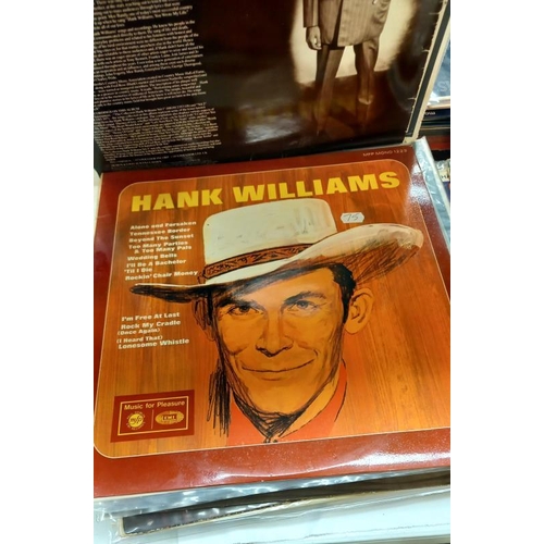 405 - A quantity of Hank Williams LP's 25+