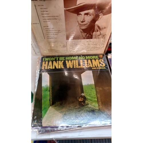 405 - A quantity of Hank Williams LP's 25+