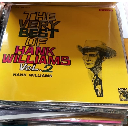 423 - A quantity of Hank Williams LP's 25+